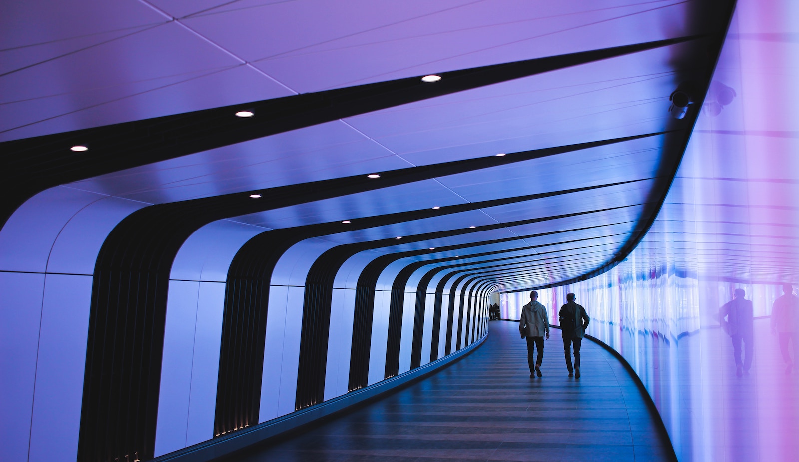 Technology consultants walking in a modern office